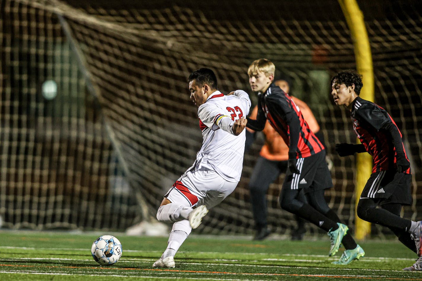 Richfield's Antwane Ruiz found an open spot and put this kick into the Worthington net for the game-winning goal in a 2-1 victory. Class 2A boys' soccer state tournament quarterfinals at Farmington, Worthington vs. Richfield, 10-26-22. Photo by Mark Hvidsten, SportsEngine