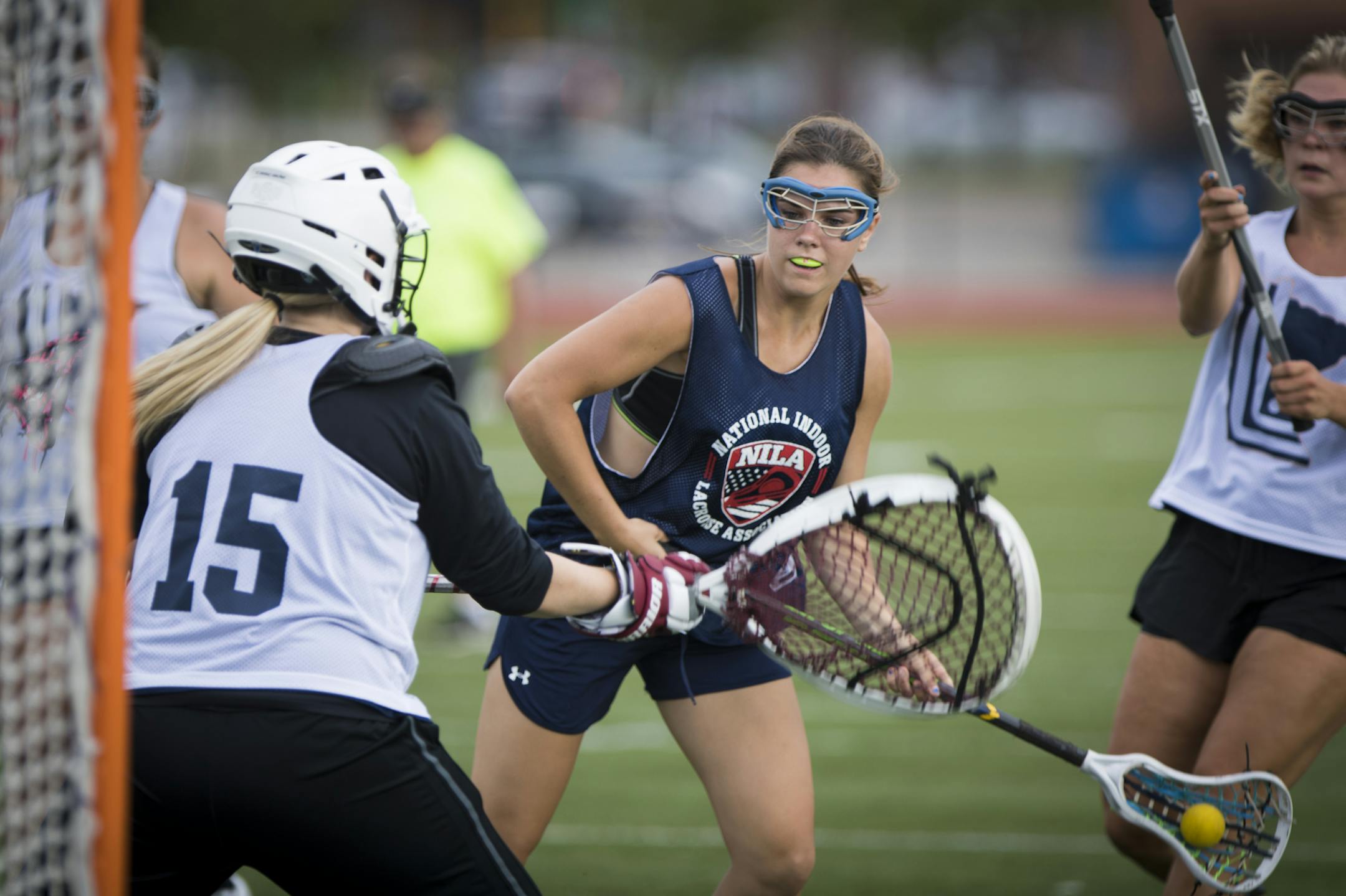 Kailey Heinl, center, scored during a recent summer league game. Heinl is one of 17 freshman recruits for the inaugural women&#x2019;s lacrosse team at Concordia (St. Paul).
