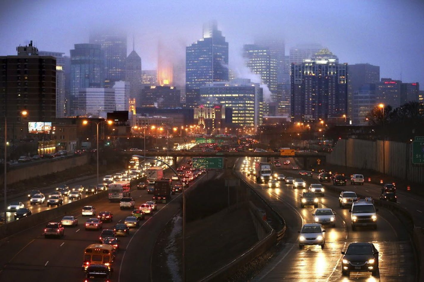 In this Dec. 11, 2014 photo, traffic moves on Interstate 35W between downtown Minneapolis and the Crosstown Hwy.