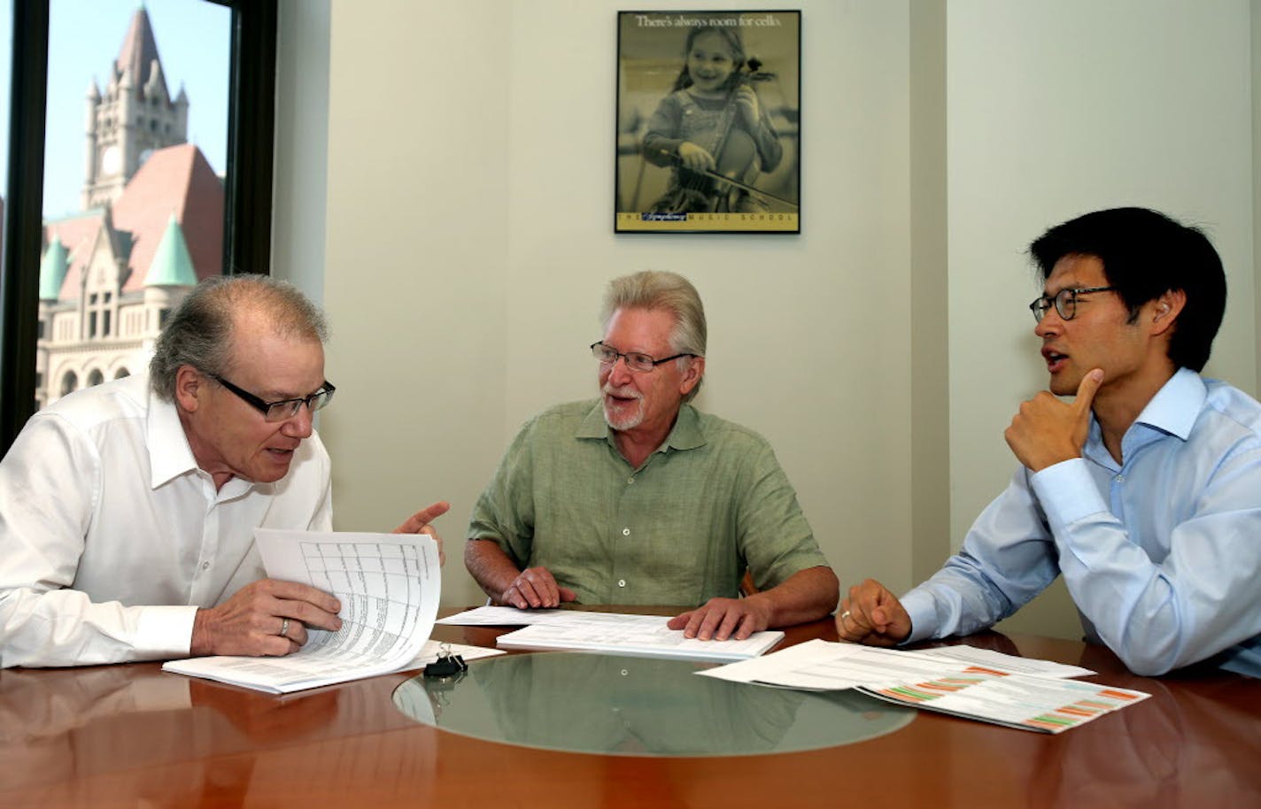 From left, SPCO President Bruce Coppock conferred with his assistant Tom Kornacker and Kyu-Young Kim in 2013 as the orchestra prepared for its first full season after the six-month lockout.