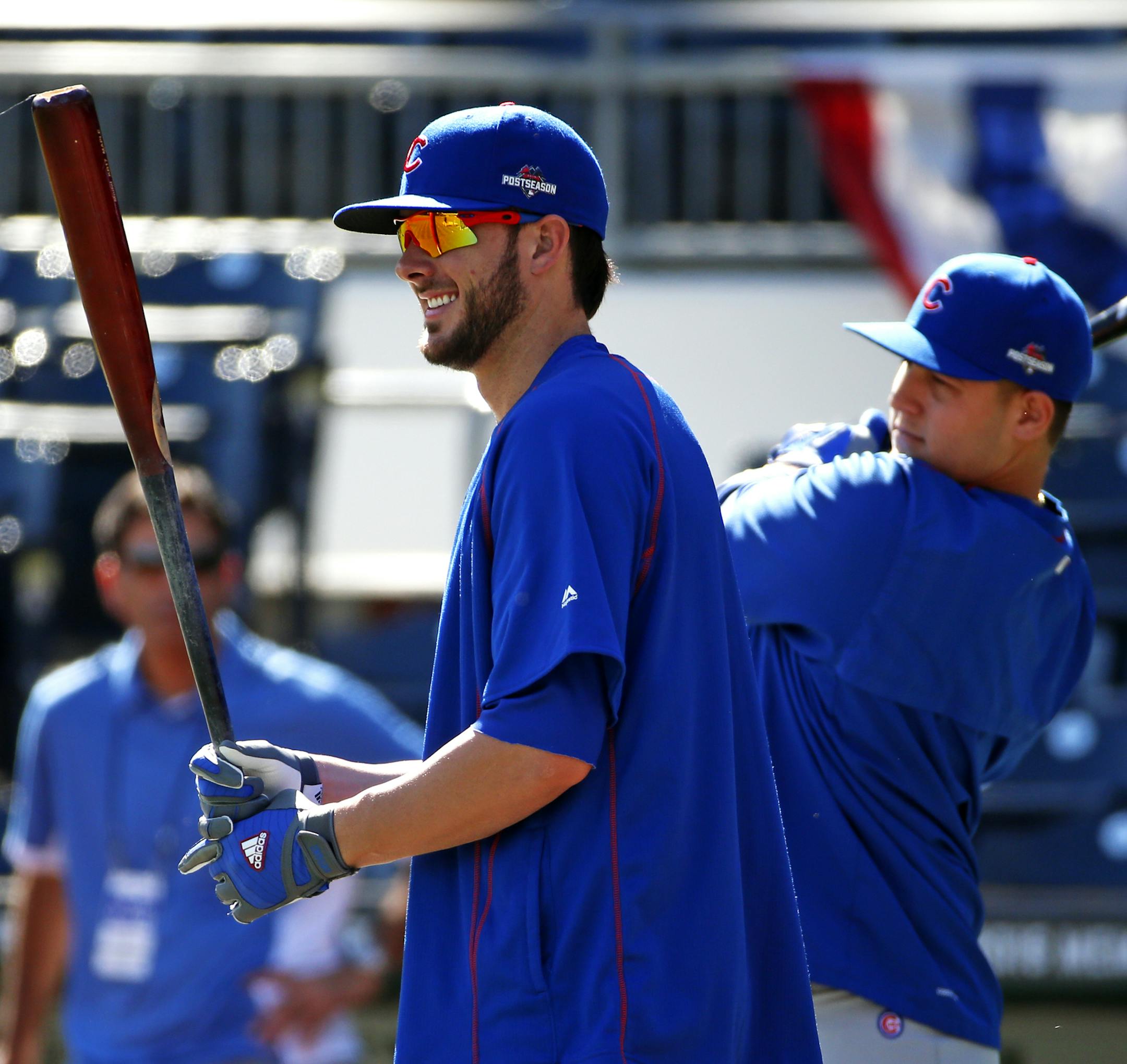 Chicago Cubs' Kris Bryant, left, and Anthony Rizzo wait their turns in the batting cage during workout day, Tuesday, Oct. 6, 2015, for Wednesday's National League Wild Card baseball game against the Pittsburgh Pirates at PNC Park in Pittsburgh. (AP Photo/Gene J. Puskar)