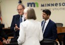 Jonathan Bram, left, of Global Infrastructure Partners, and Palak Trivedi of Canadian Pension Plan chat with Allete CEO Bethany Owen after the Minneso