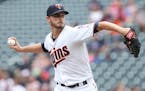 Minnesota Twins pitcher Buck Farmer throws against the Detroit Tigers in the first inning of a baseball game Sunday Aug. 19, 2018 in Minneapolis. (AP 