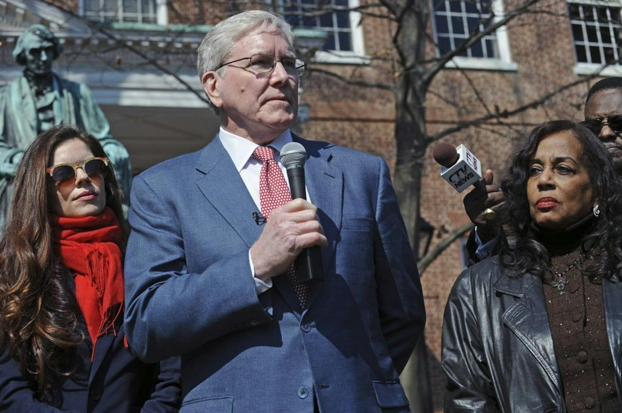 Charles Taney III, a descendant of U.S. Supreme Court Chief Justice Roger Taney, center, offers apology to Lynne Jackson, a descendant of Dred Scott, right, on the 160th anniversary of the Dred Scott decision in front of the Maryland State House, Monday, March 6, 2017, in Annapolis, Md. On March 6, 1857, the U.S. Supreme Court, in Dred Scott v. Sandford, ruled 7-2 that Scott, a slave, was not an American citizen and therefore could not sue for his freedom in federal court.