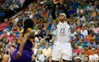 Minnesota Lynx forward Maya Moore (23) shoots the ball against Los Angeles Sparks forward Nneka Ogwumike (30) during the first half of a WNBA basketba