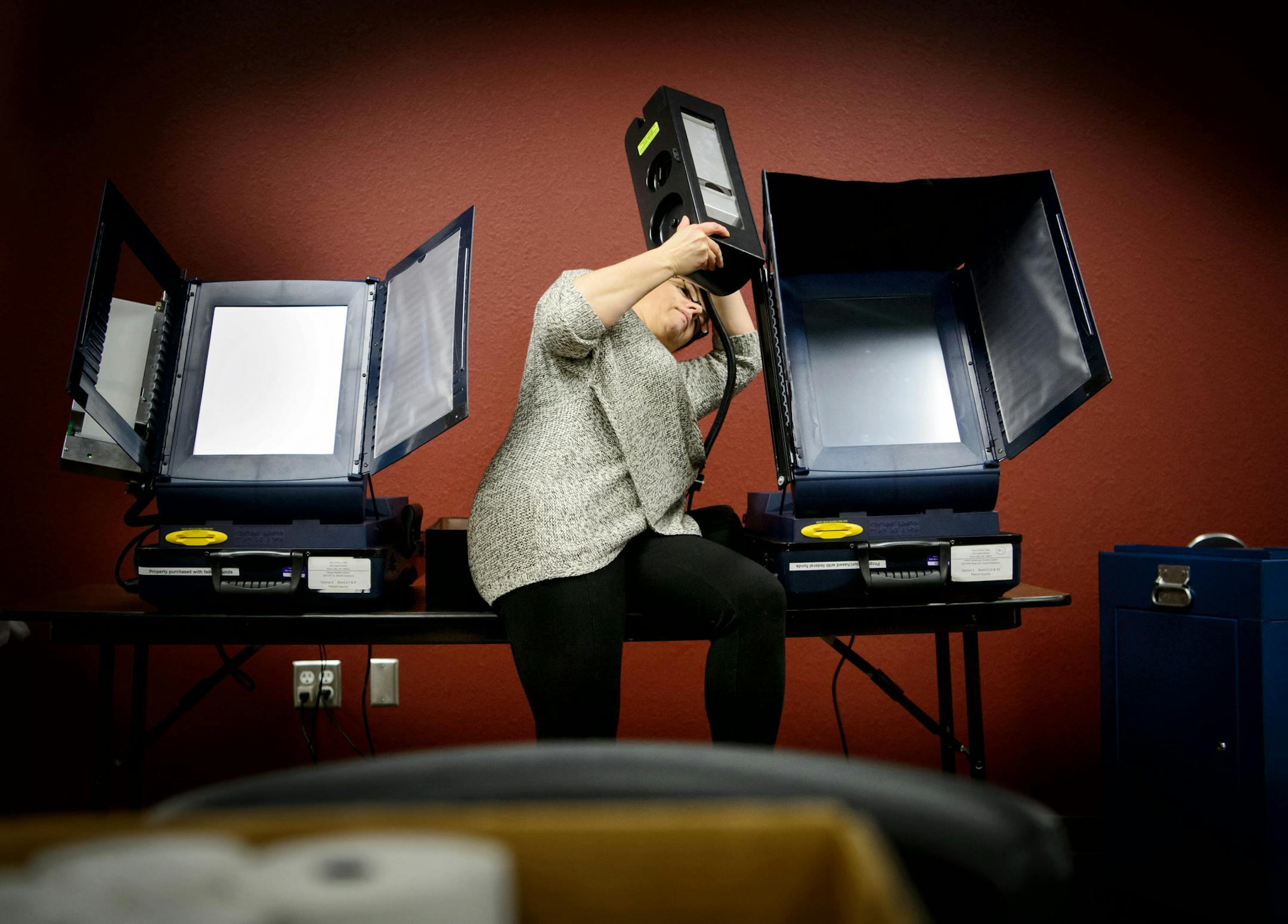 River Falls deputy city clerk Bridget Hieb, tested voting machines at City Hall before the April 5 election. ] GLEN STUBBE * gstubbe@startribune.com Wednesday, March 23, 2016