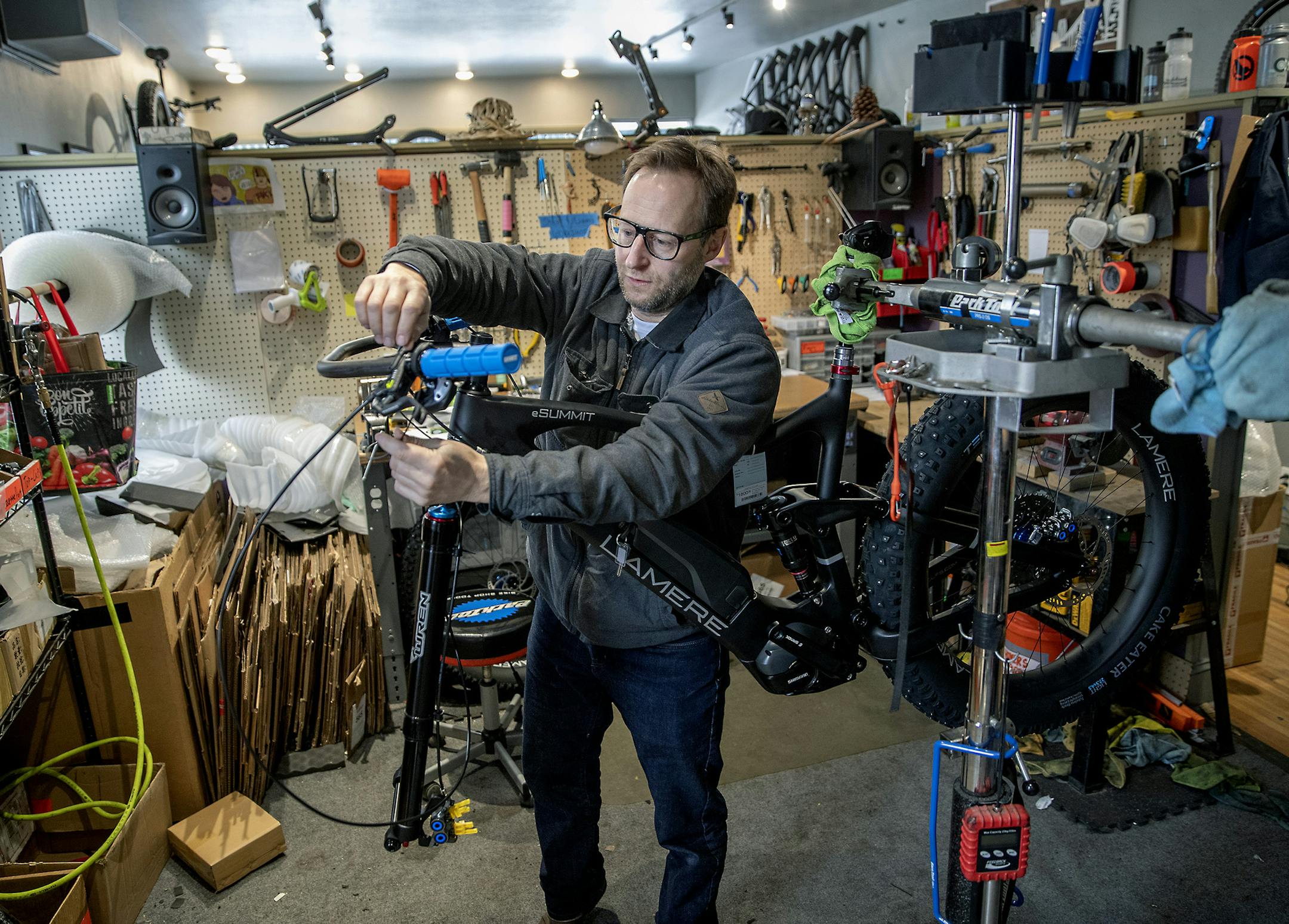 JP MaMere, a Twin Cities bike dealer, has developed a fat tire e-bike that he says is priced below similar models made by rivals. The LaMere E-bike is assembled in the LaMere Cycles shop in Uptown. ] ELIZABETH FLORES &#x2022; liz.flores@startribune.com
