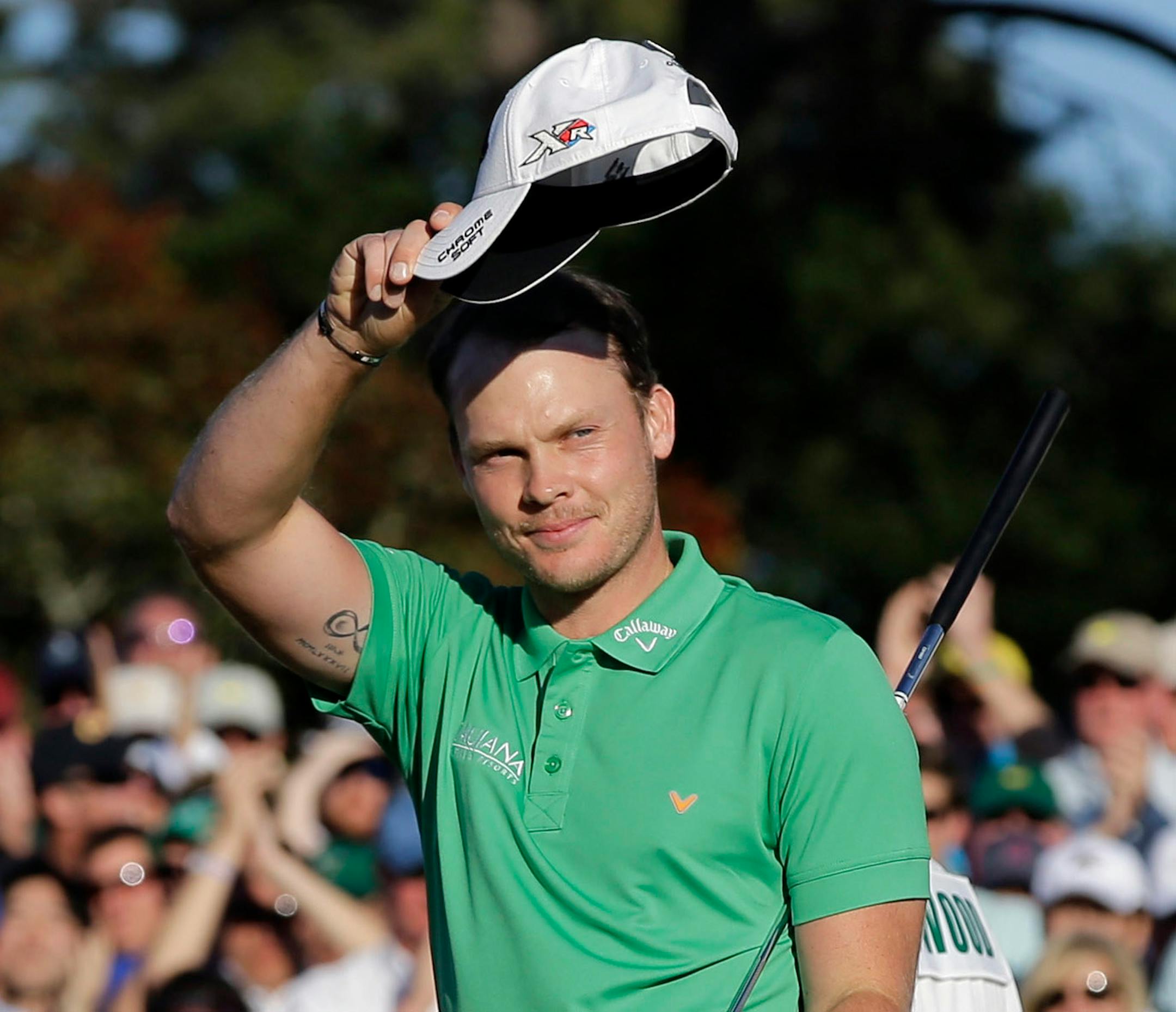Danny Willett waved to the gallery after putting out on the 18th hole during Sunday's final round of the Masters. Willett shot a 5-under-par 67.