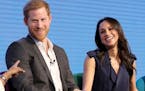 Britain's Prince Harry and Meghan Markle during the first annual Royal Foundation Forum in London, Wednesday Feb. 28, 2018.
