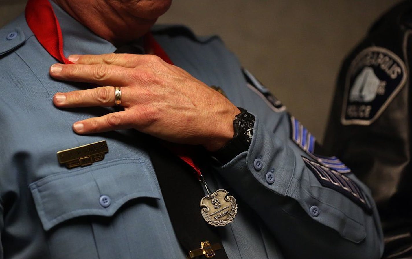 Sergeant Kent Warnberg was given a Medal of Valor by Police Chief Janee Harteau during the ceremony.