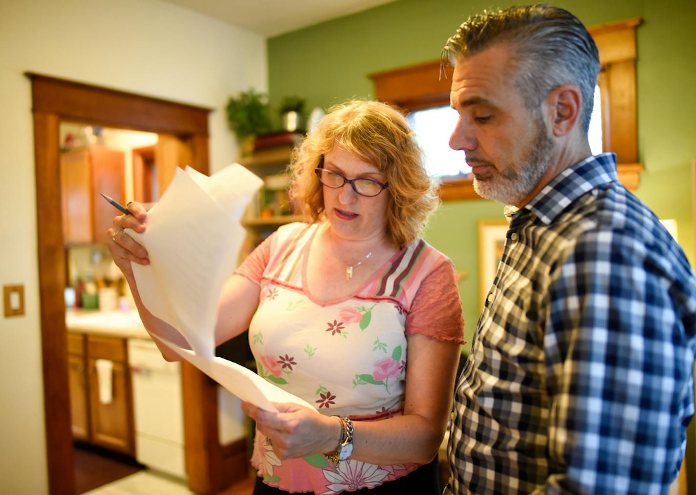 Shanan Custer looked through her script while taking part in a rehearsal for "Couple Fight: The Musical!" with her husband, Eric Webster, in 2018.