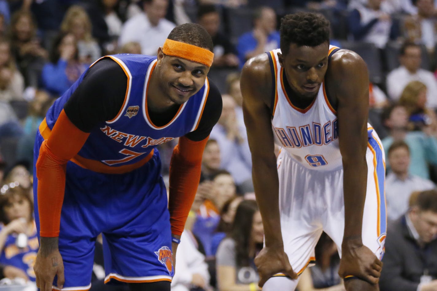 New York Knicks forward Carmelo Anthony (7) smiles at a fan as he waits for a foul shot with Oklahoma City Thunder forward Jerami Grant (9) in the fourth quarter of an NBA game in Oklahoma City, Wednesday, Feb. 15, 2017.