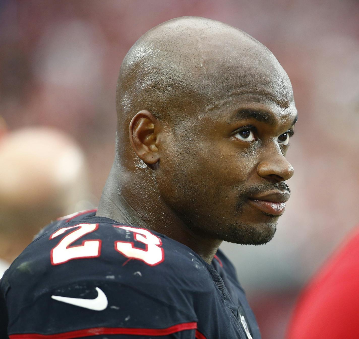 Arizona Cardinals running back Adrian Peterson (23) takes a break on the sidelines during the second half of an NFL football game against the Tampa Bay Buccaneers Sunday, Oct. 15, 2017, in Glendale, Ariz. (AP Photo/Ralph Freso) ORG XMIT: RFOTK361