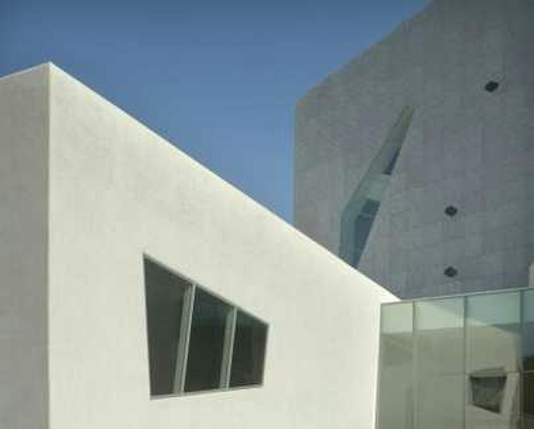 The new Walker Art Center addition's design adds more exterior points of interest, including irregularly shaped windows, a variety of textures and surface shine.