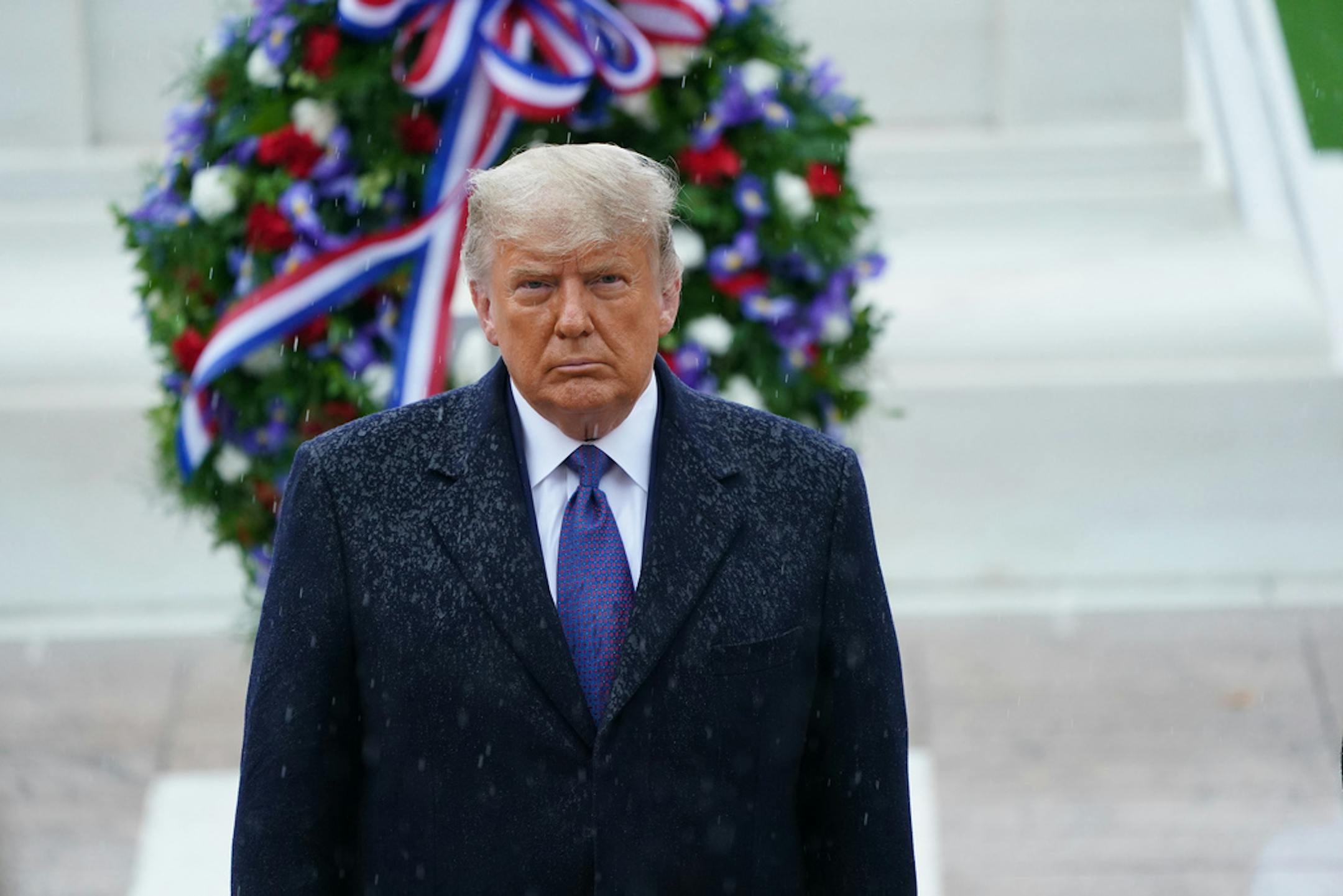 President Donald Trump took part in a wreath laying at the Tomb of the Unknown Soldier during a National Veterans Day Observance ceremony Wednesday at Arlington National Cemetery in Arlington, Va.
