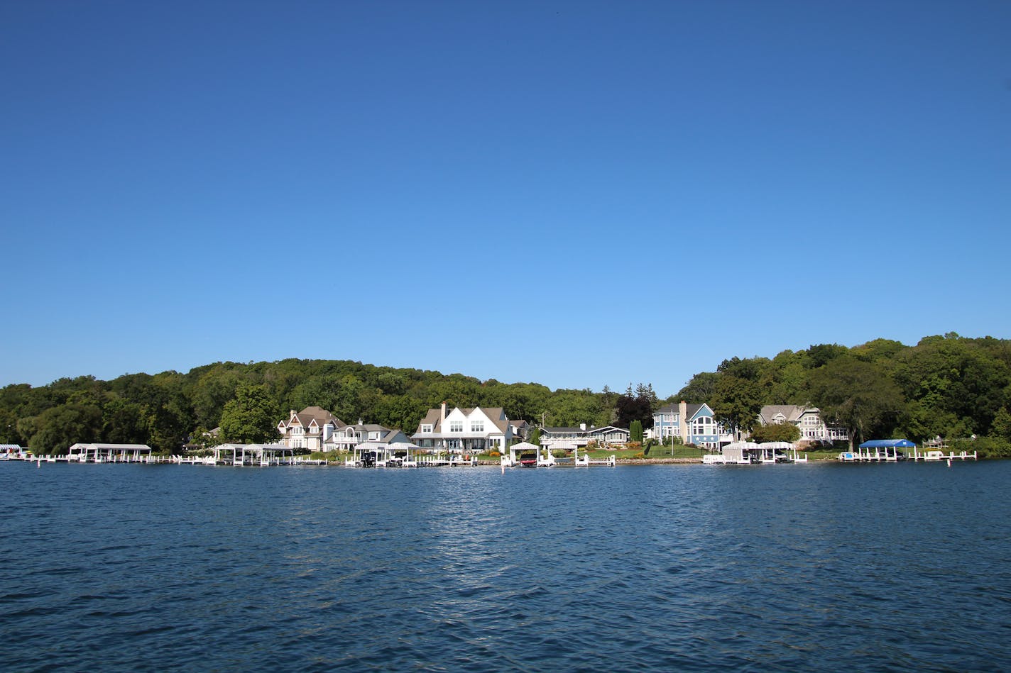 The shoreline of Lake Geneva is about 21 miles long, although the path encircling it stretches on for 26 miles as it intertwines among hills, forests and upscale neighborhoods. (Mary Ann Anderson/TNS)