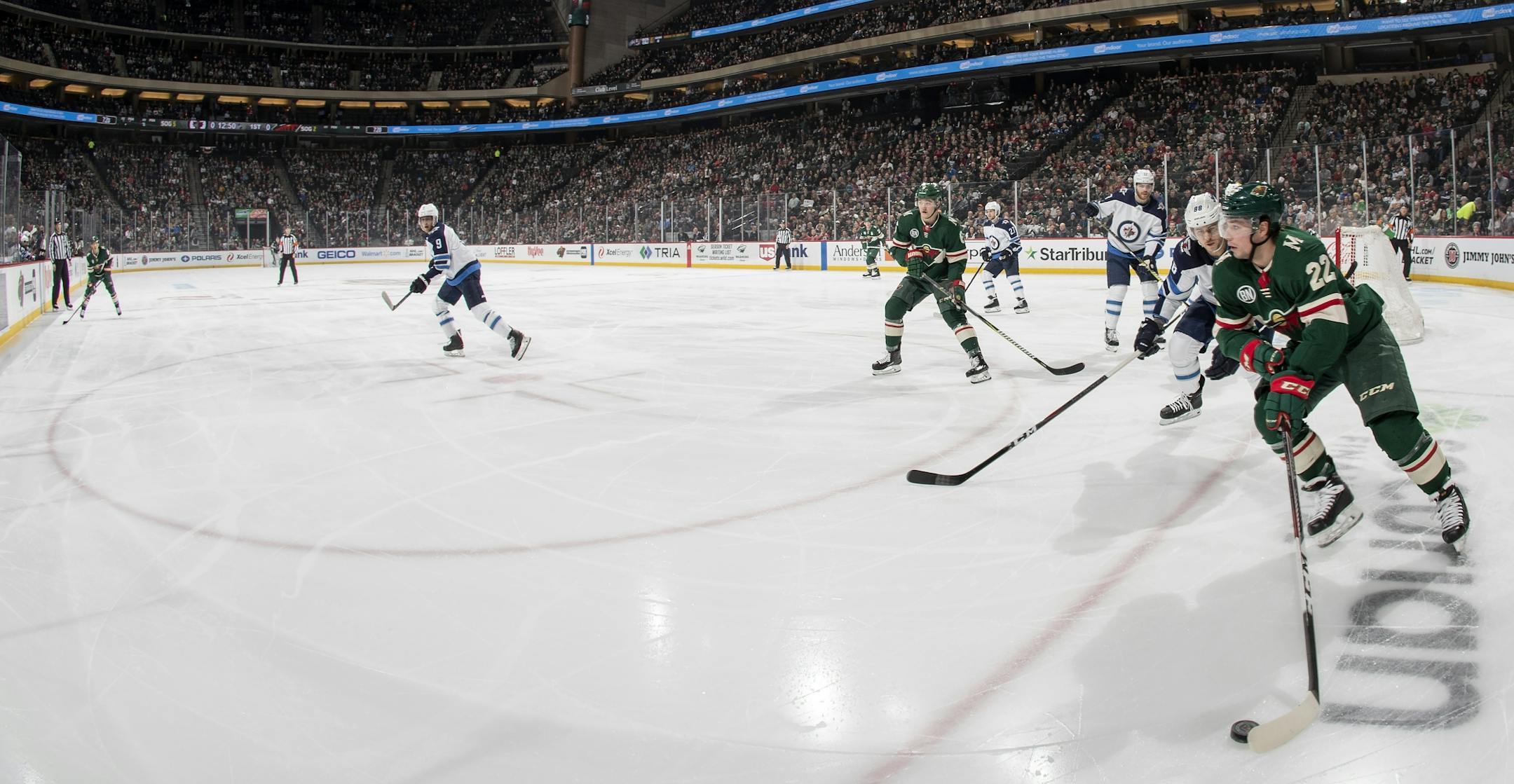 Kevin Fiala (22) skated with the puck in the first period.