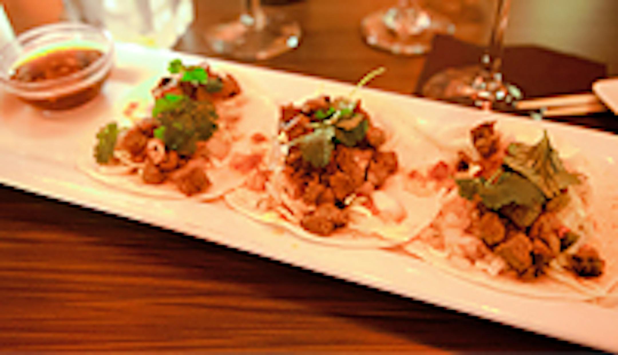 Korean tacos have crunch slaw and spicy sauce at Social House