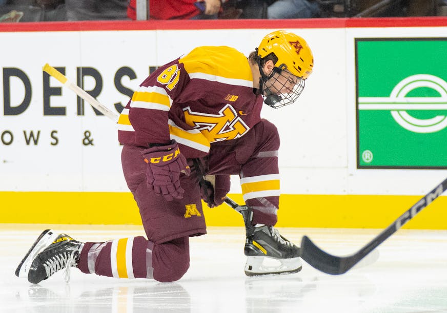 Minnesota forward Jimmy Snuggerud (81) celebrates after scoring a goal against St. Thomas in the third period Friday, Oct. 13, 2023, at Xcel Energy Arena in St. Paul, Minn. ]