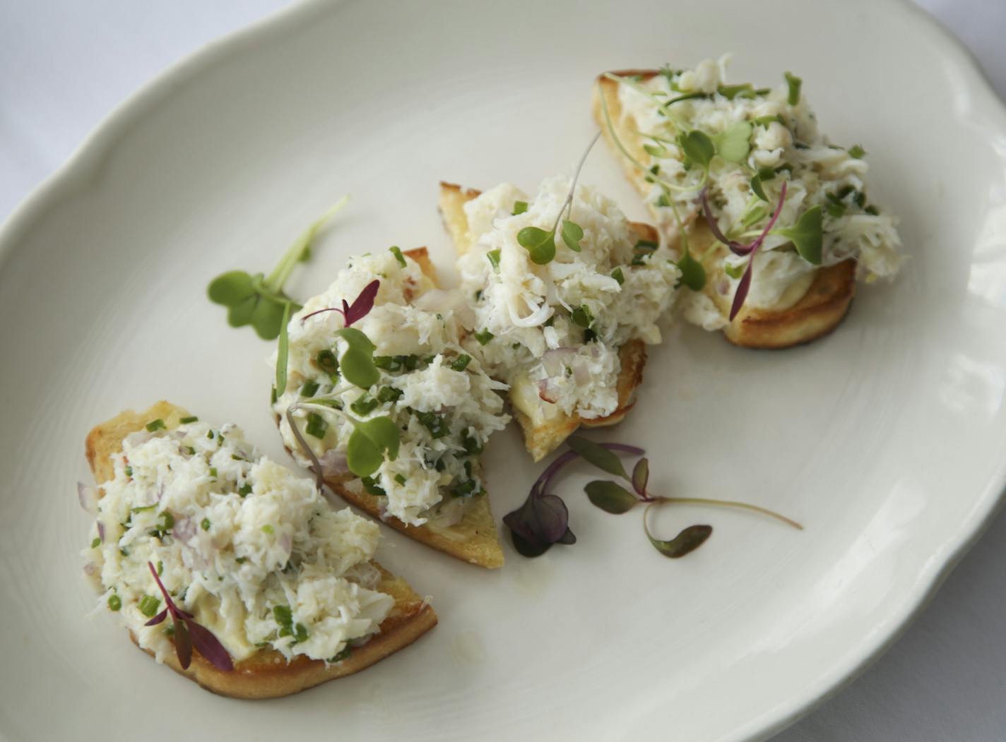 The crab toast from Joan's in the Park in St. Paul, as prepared Thursday afternoon. ] JEFF WHEELER &#xef; jeff.wheeler@startribune.com Joan Schmitt, left, and Susan Dunlop of Joan's in the Park in St. Paul Thursday afternoon, May 28, 2015.