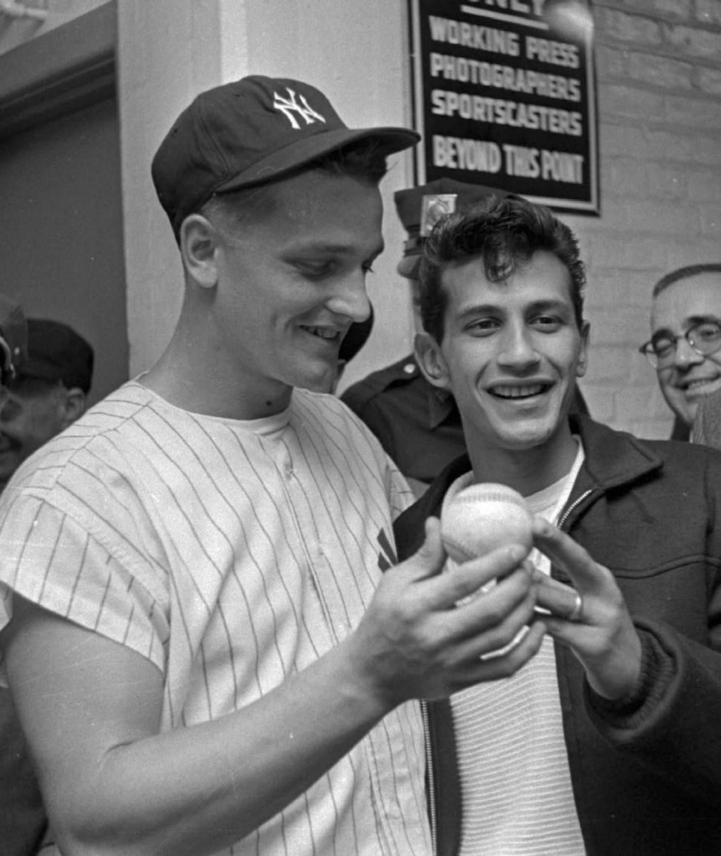 New York Yankees' Roger Maris and Sal Durante, 19, hold Maris' 61st home run ball in the runway at New York's Yankee Stadium in this Oct. 1, 1961 file photo, after Durante caught the ball in the right field stands in the game's fourth inning.