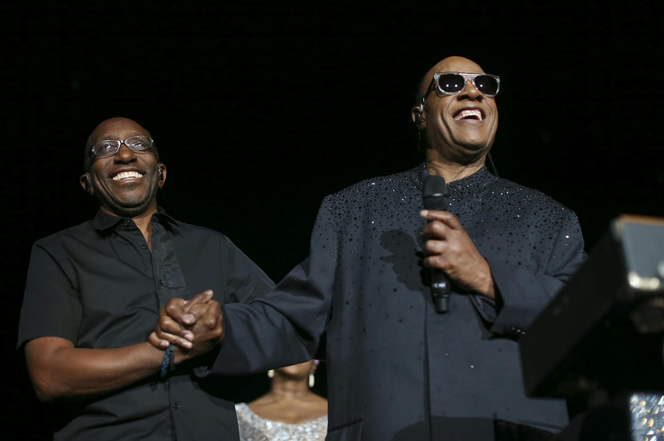 Stevie Wonder introduced his longtime band leader, Greg Phillinganes, before beginning with the first cut on the album, "Love's in Need of Love Today" Sunday night at Target Center.