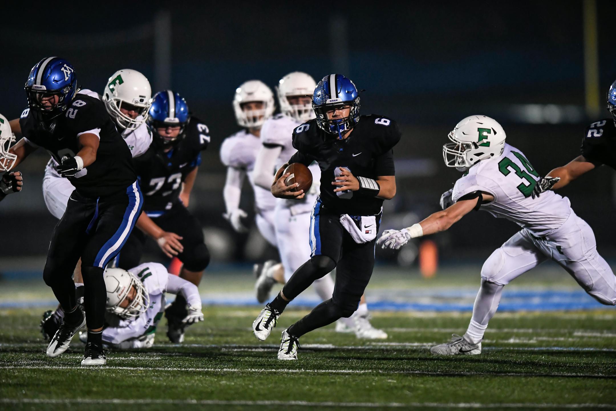 Minnetonka quarterback Aaron Syverson cut upfield on a first-quarter run against Edina on Friday. The No. 2 Skippers face No. 1 Eden Prairie on Friday night.