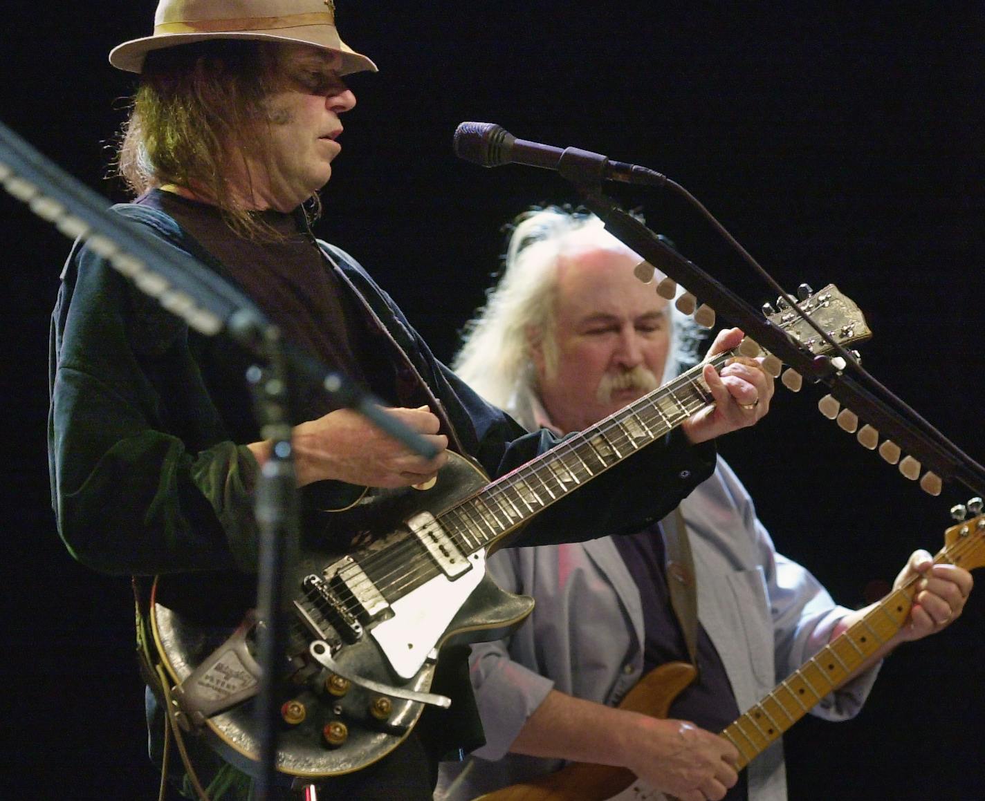 TUESDAY_03/12/02_Minneapolis - - - - - - - Neil Young and David Crosby in concert at the Target Center during a C.S.N.Y. performance.