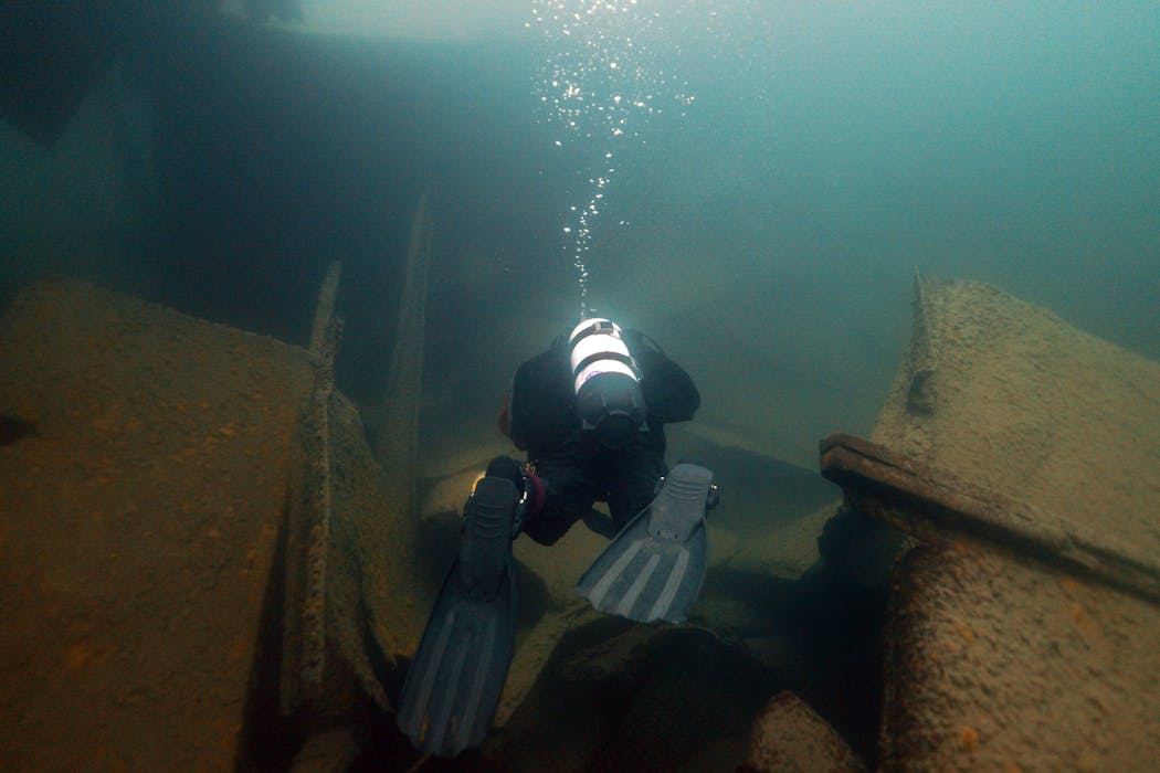 Jim Christenson, a diver with the Great Lakes Shipwreck Preservation Society from Columbia Heights, swam among the wreckage of the Madeira in 2019.