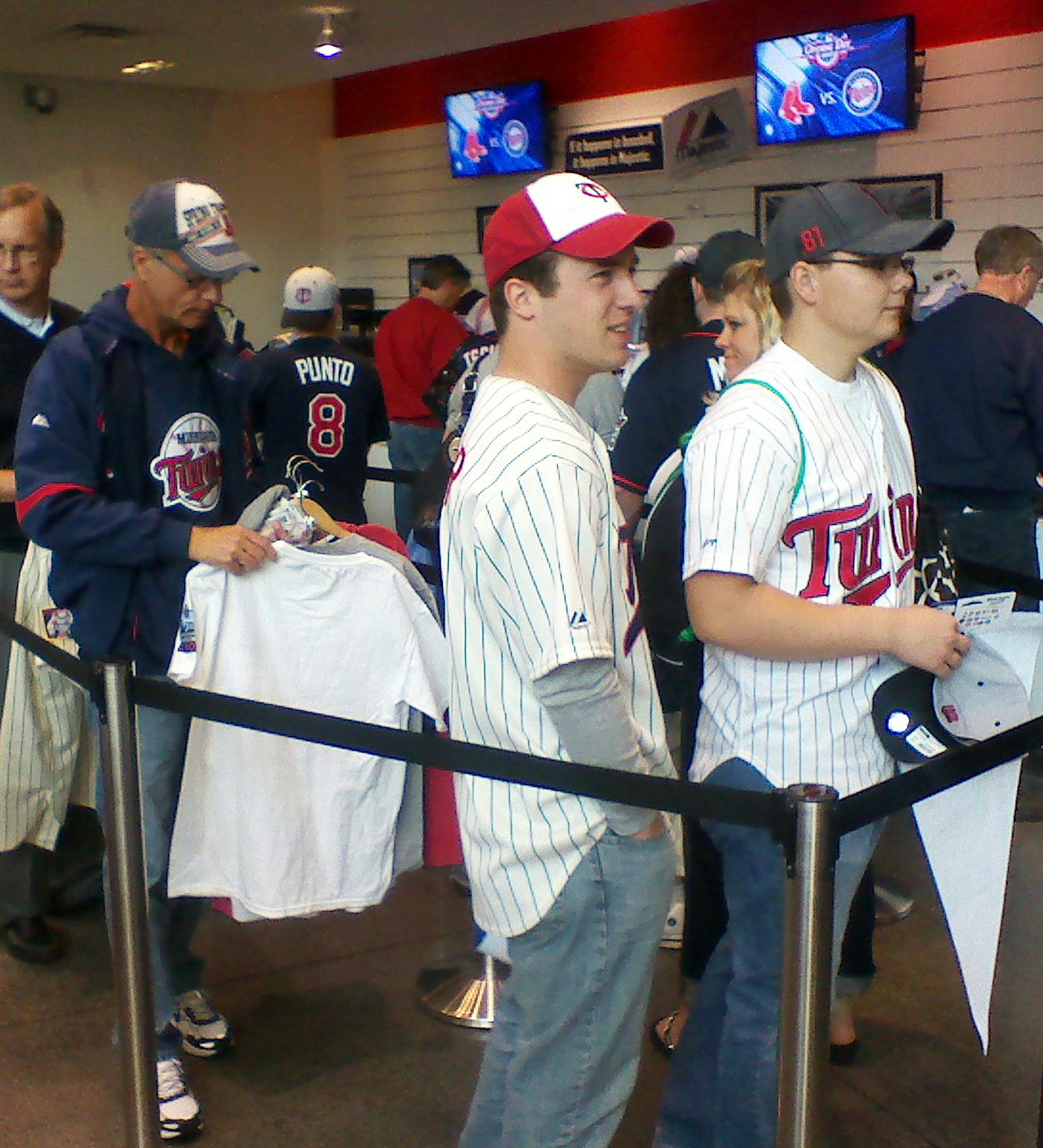 Twins fans crowd the fan shop at Target Field on opening day.