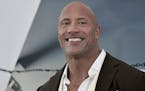 FILE - Dwayne Johnson attends the premiere of "Fast & Furious Presents: Hobbs & Shaw" on July 13, 2019, in Los Angeles. Johnson said he has acquired t