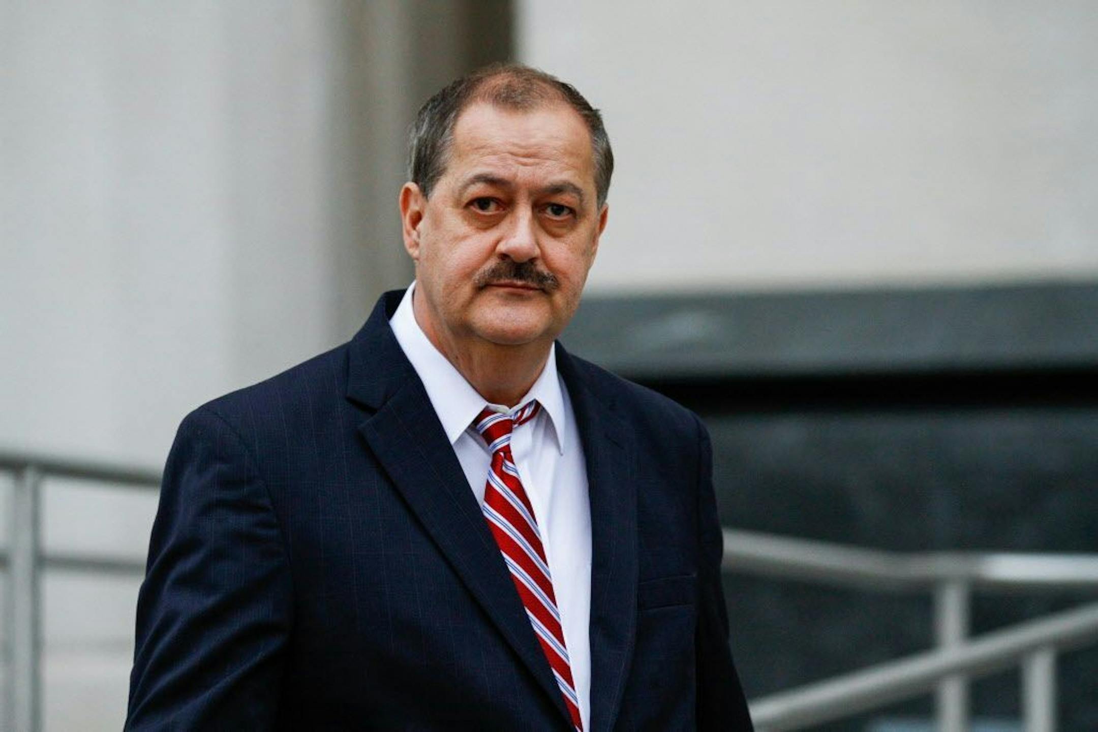 FILE -- Former Massey Energy CEO Don Blankenship departs the Robert C. Byrd United States Courthouse following the second day of jury deliberation in Charleston, W.Va., Wednesday, Nov. 18, 2015.