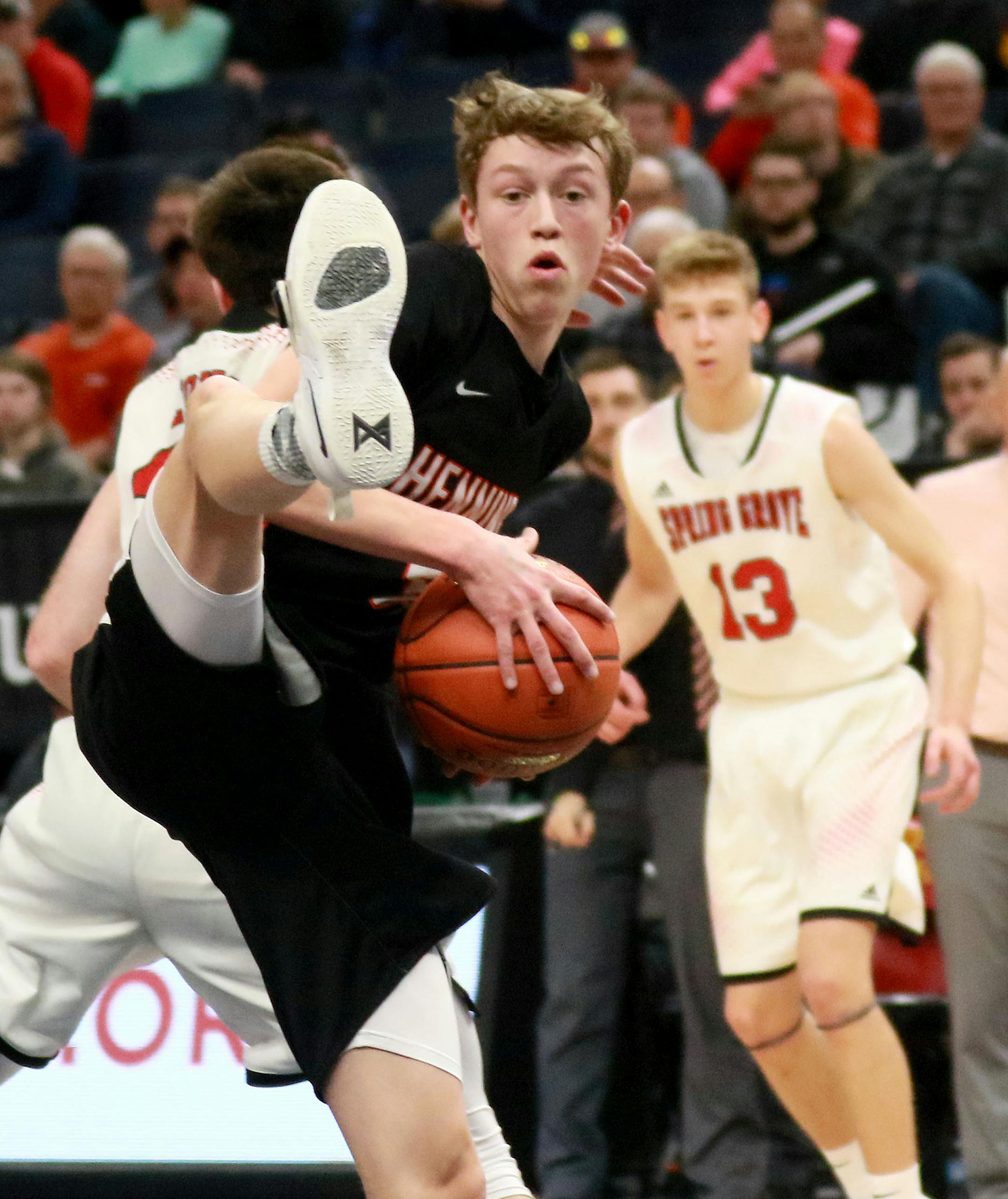 Henning's Parker Fraki (3) goes high for a rebound against Spring Grove during the first half of the Class 1A boys' basketball semifinals Friday, March 22, 2019, at the Target Center in Minneapolis, MN.] DAVID JOLES •david.joles@startribune.com Class 1A boys' basketball semifinals, games at noon, 2 p.m. Spring Grove and Henning and Ada Borup and Northwoods