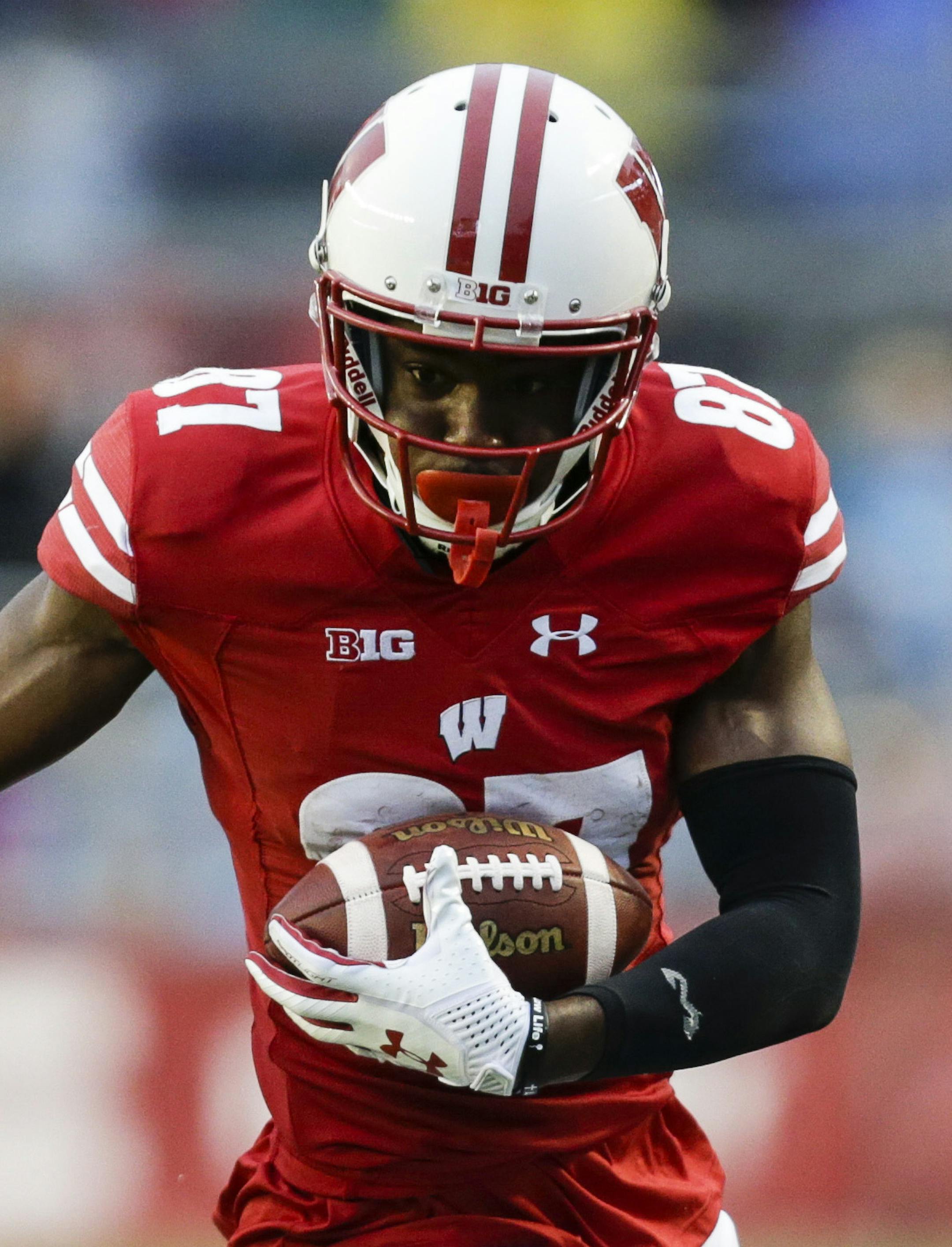 Wisconsin wide receiver Quintez Cephus runs against Purdue cornerback Da'Wan Hunte after a reception in the second half of an NCAA college football game Saturday, Oct. 14, 2017, in Madison, Wis. Wisconsin won 17-9. (AP Photo/Andy Manis) ORG XMIT: MIN2017110919395836