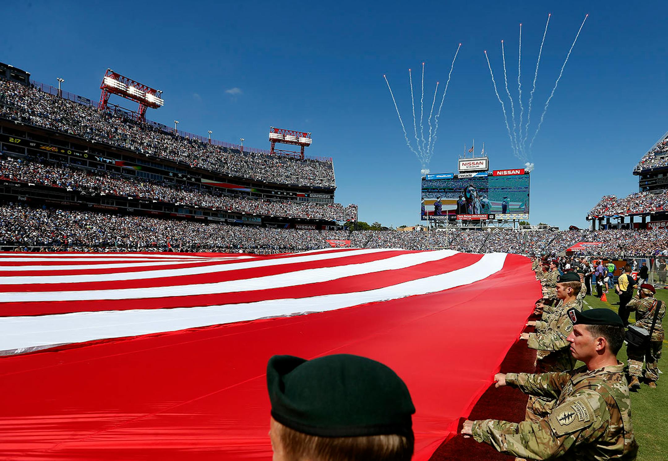 The a US flag covered the field during the National Anthem before the start of Sunday's game. ] CARLOS GONZALEZ cgonzalez@startribune.com - September 11, 2016, Nashville, TN, Nissan Stadium, NFL, Minnesota Vikings vs. Tennessee Titans