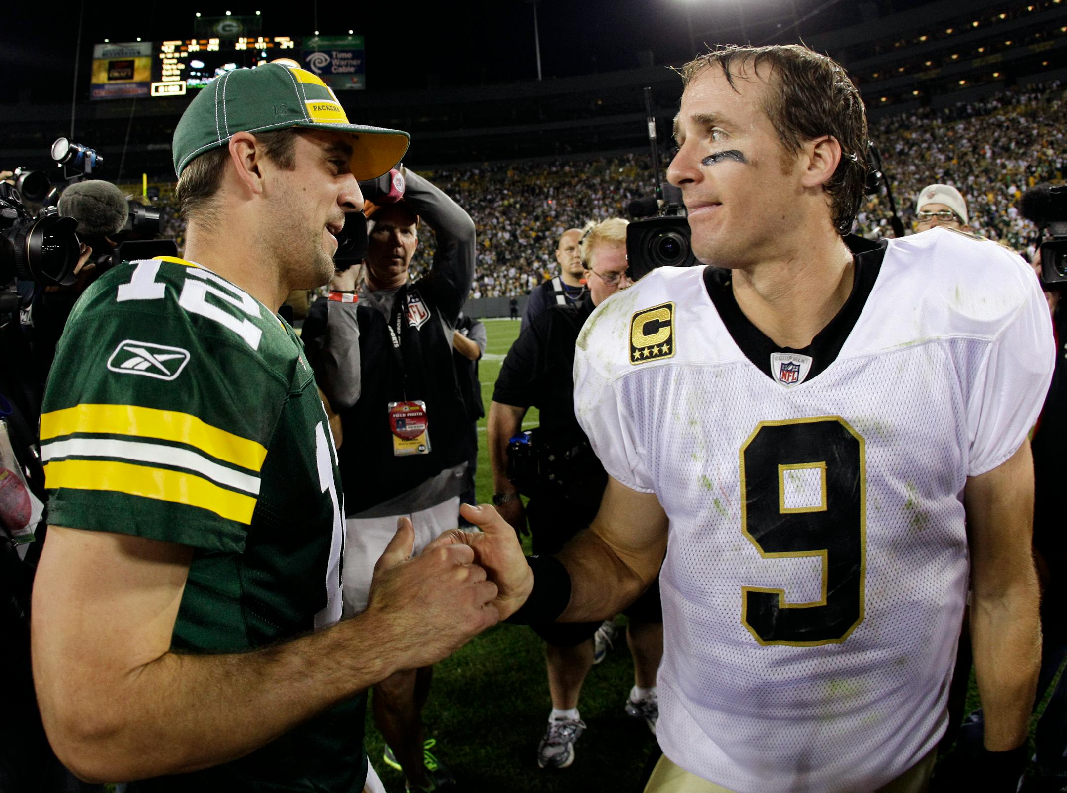 Aaron Rodgers, left, and the Packers got the upper hand on Drew Brees and the Saints in the season opener. Both quarterbacks figure to battle for the NFL MVP, and maybe even a trip to the Super Bowl.