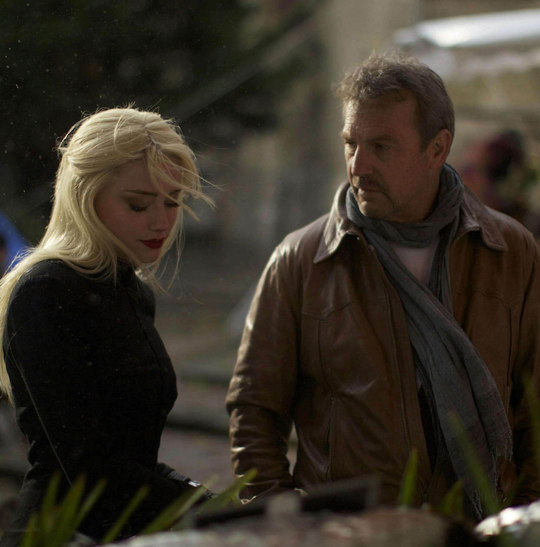 Relativity Media Amber Heard and Kevin Costner in "3 Days to Kill."