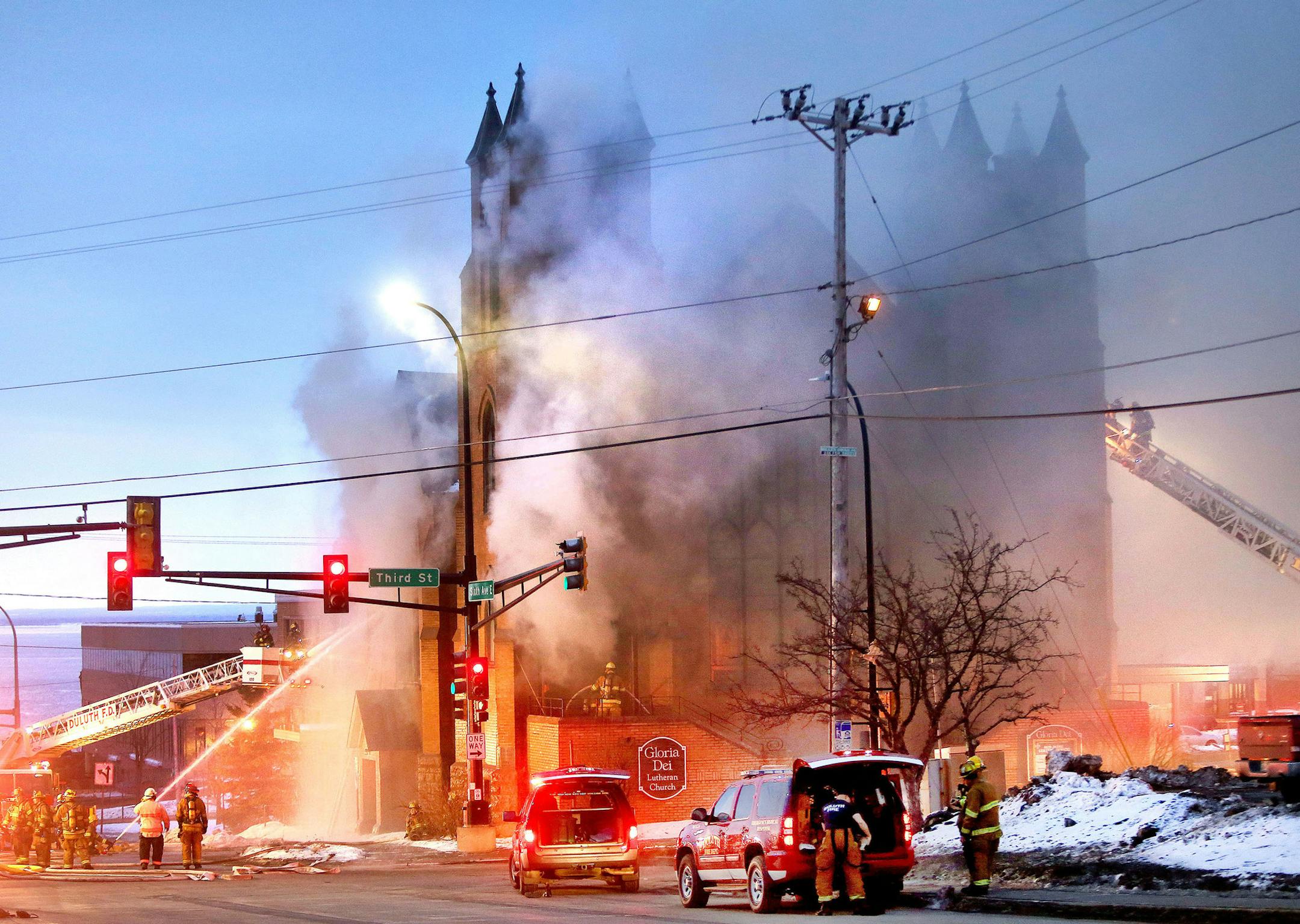 t2.18.16 Bob King -- kingCHURCHFIRE0219c4 -- Duluth firefighting crews battle a large fire in Gloria Dei Lutheran Church early Thursday morning. Bob King / rking@duluthnews.com