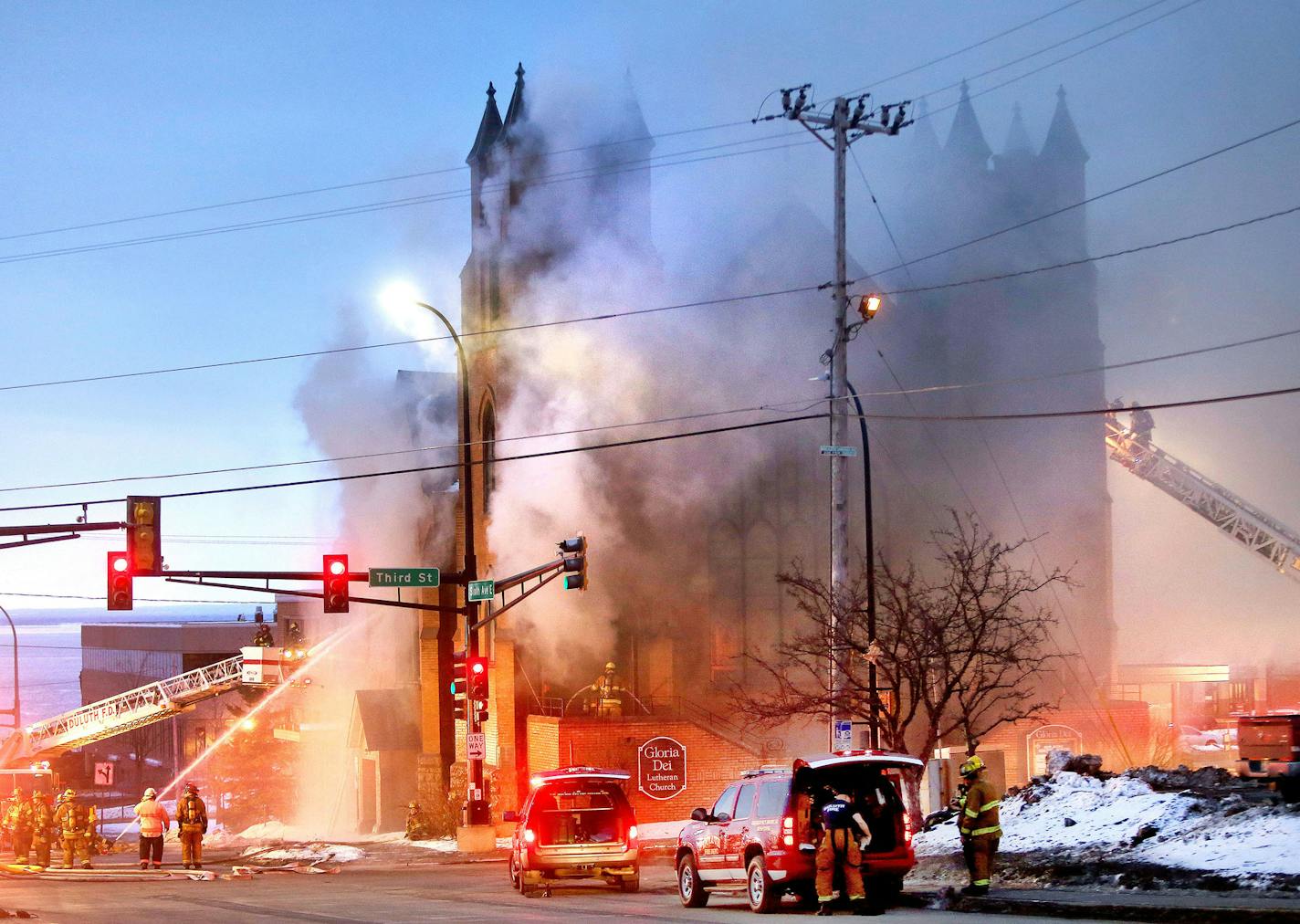 t2.18.16 Bob King -- kingCHURCHFIRE0219c4 -- Duluth firefighting crews battle a large fire in Gloria Dei Lutheran Church early Thursday morning. Bob King / rking@duluthnews.com