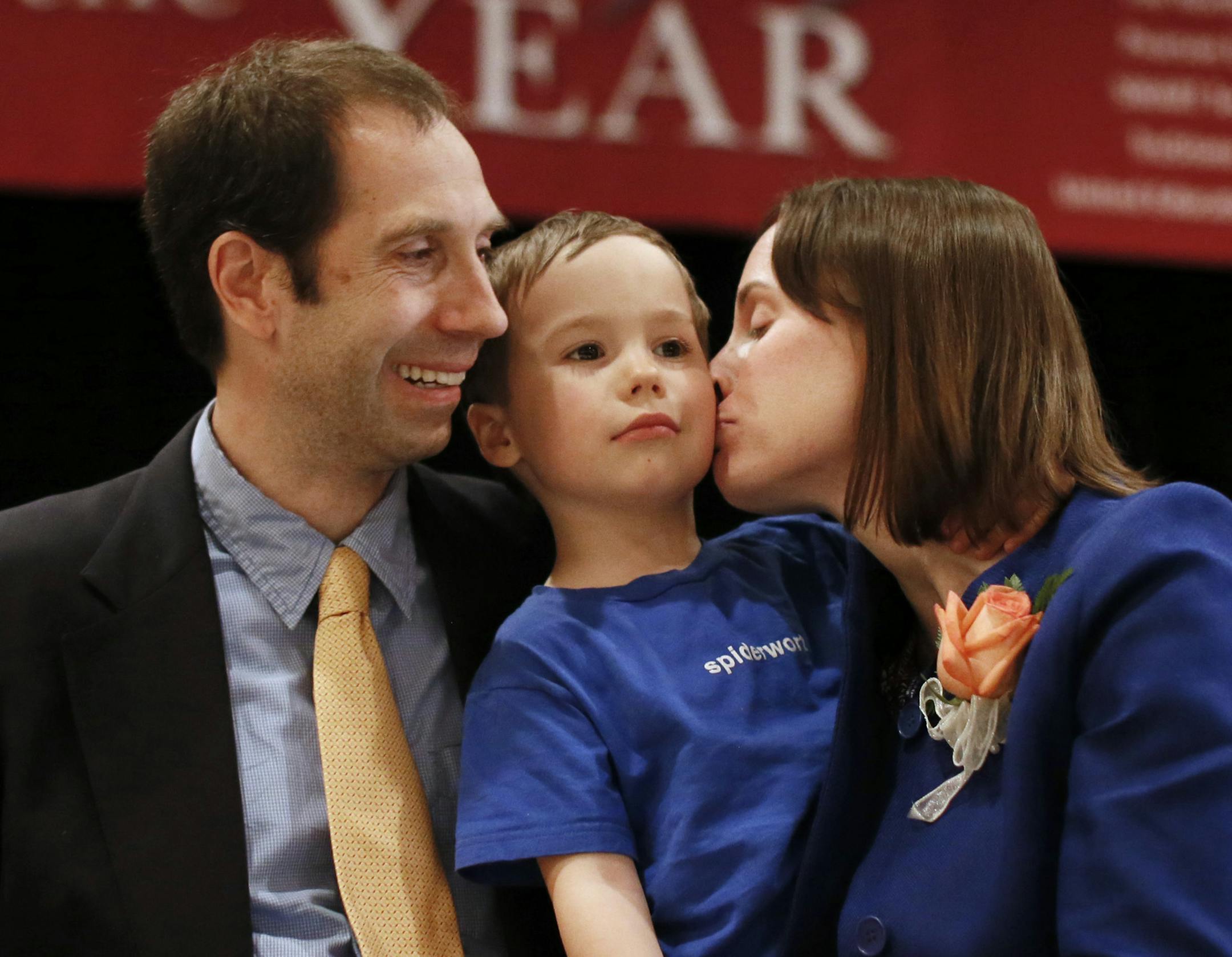 Megan Olivia Hall hugged her husband Leo Bickelhaupt and kissed their son Dylan Bickelhall , 31/2 after she was named the 2013 Minnesota Teacher of the Year Sunday May 5, 2013 in Brooklyn Park , MN. ] JERRY HOLT ‚Ä¢ jerry.holt@startribune.com