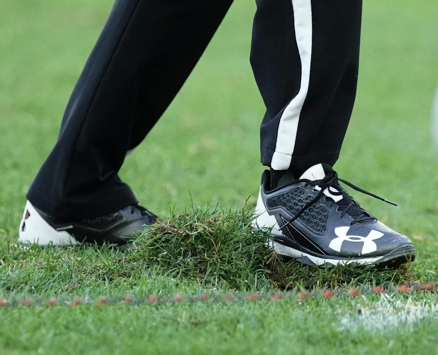 Officials attempted to repair damaged turf after a rough play in the fourth quarter. ] MARK VANCLEAVE &#xa5; St. John's University played the University of St. Thomas on Saturday, Oct. 19, 2019 at Allianz Field in St. Paul. St. John's defeated St. Thomas 38-20.