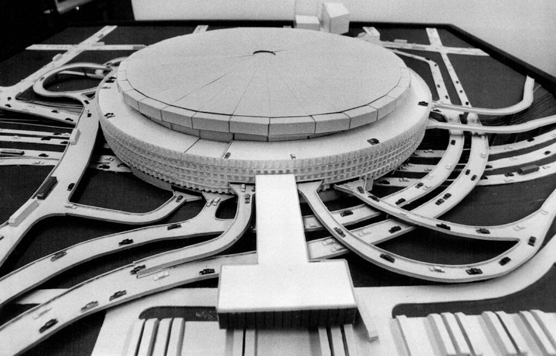 August 13, 1972 Model of the proposed $49 million Downtown domed stadium-parking ramp 1978 / Minnesotans were sitting On the edges of their bleacher seats, waiting to see if they were to have their sports indoors or out, urban or suburban. It was a tough choice, but the answer came up indoors and urban, seeing as how the Twin Cities has the toughest climate in the major leagues and may want to use the stadium to combat sub-urban sprawl in times of energy problems. Besides, the Vikings, Twins and