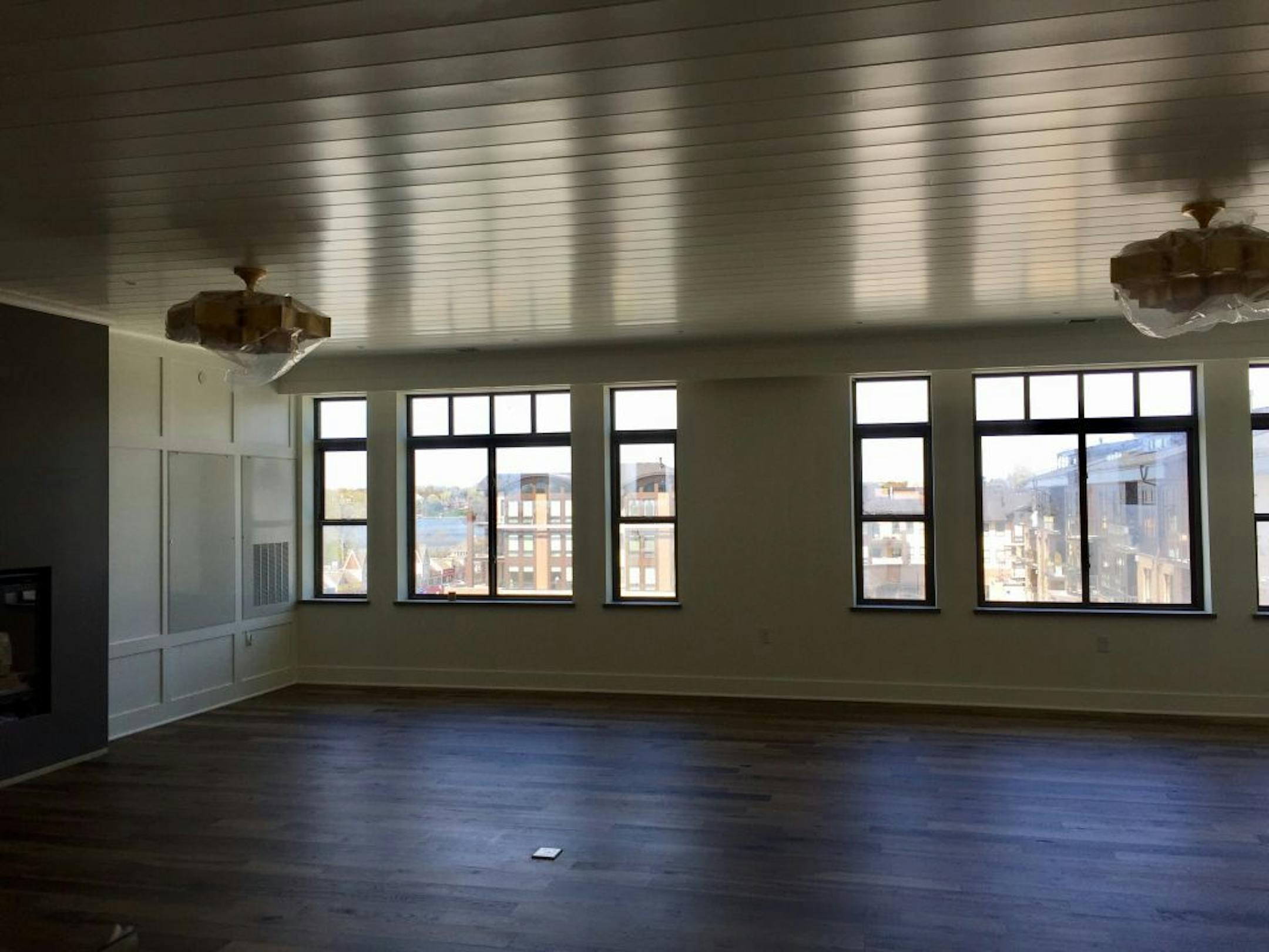 Crews wrap up work May 2, 2017 on the presidential suite at The Landing Hotel, which goes for $1,100 a night and overlooks Lake Minnetonka in Wayzata. The hotel is part of a $342 million five-block redevelopment project in Wayzata that replaced the old Wayzata Bay Center.