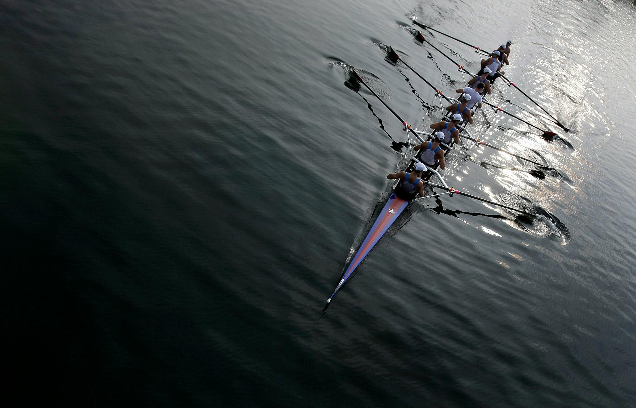 The U.S. men's eight boat headed to the starting line on Tuesday.