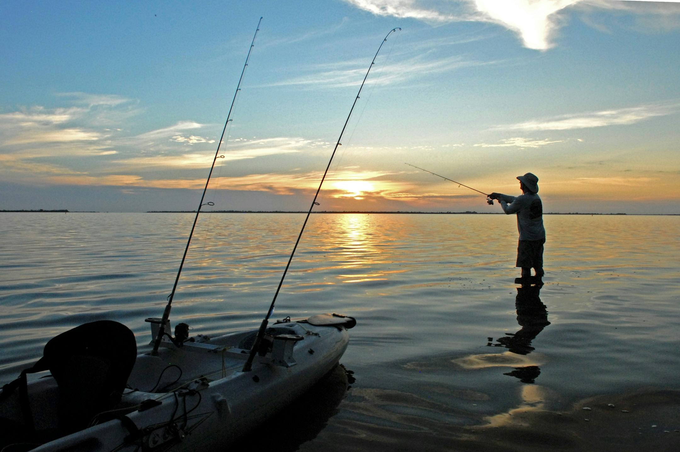 Kernon Bast of Hudson, Wis., casts a spoon into the shallow water off Pine Island, not far from Fort Myers, Fla. Bast, and avid angler, keeps a summer home in Florida, where he has had to rethink fishing completely from what he's known in Minnesota and Wisconsin.