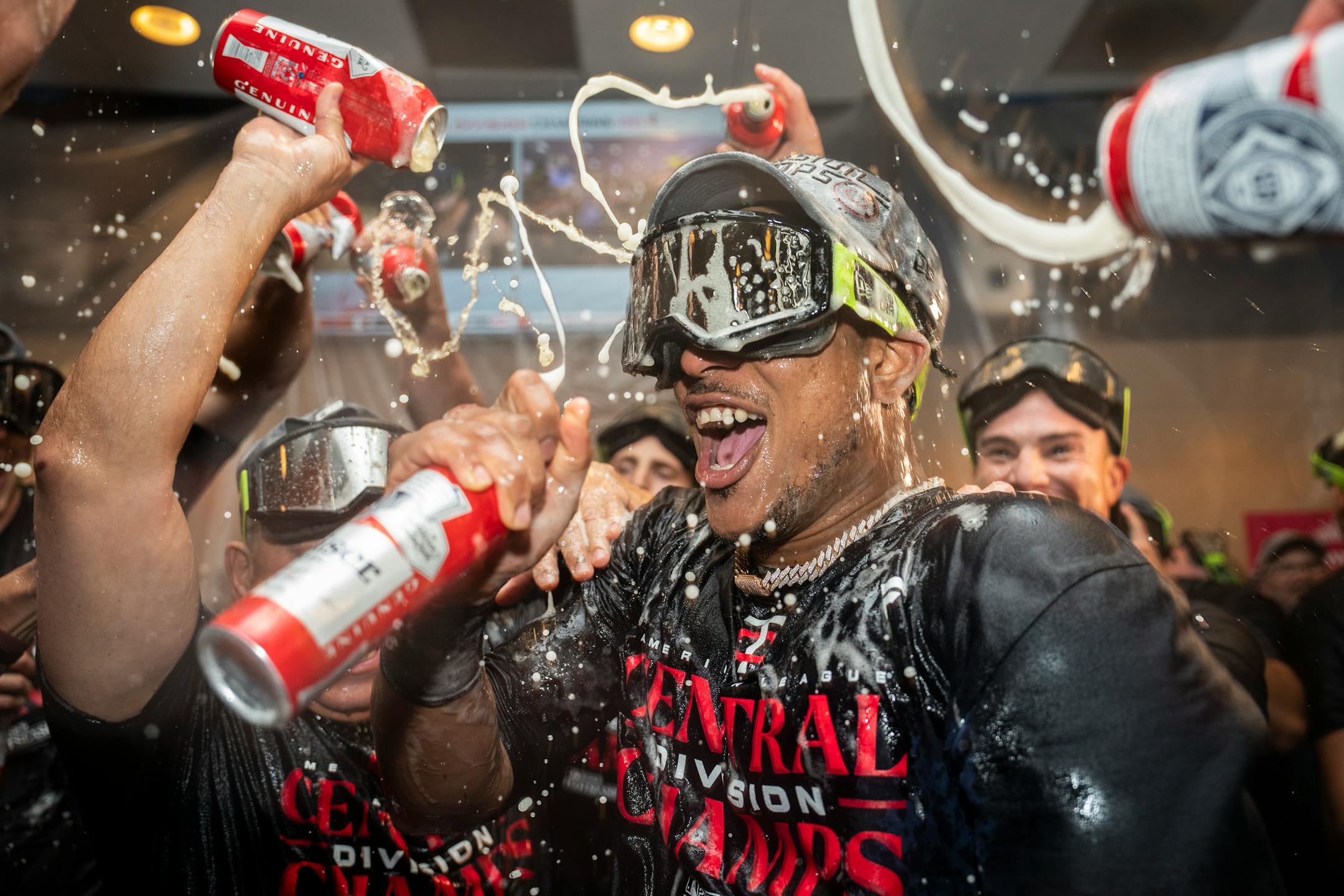 Minnesota Twins designated hitter Jorge Polanco (11) and other Twins players celebrate with champagne in the locker room after clentched the American League Central title. The Minnesota Twins hosted the Los Angeles Angels at Target Field on Friday, Sept. 22, 2023 in Minneapolis, Minn. ] RENEE JONES SCHNEIDER • renee.jones@startribune.com