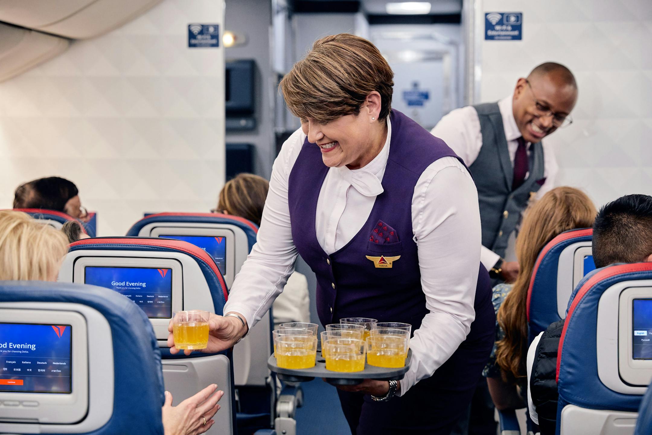 Delta later this year will offer "welcome cocktails" and other new amenities to passengers on all international flights exceeding 6.5 hours.