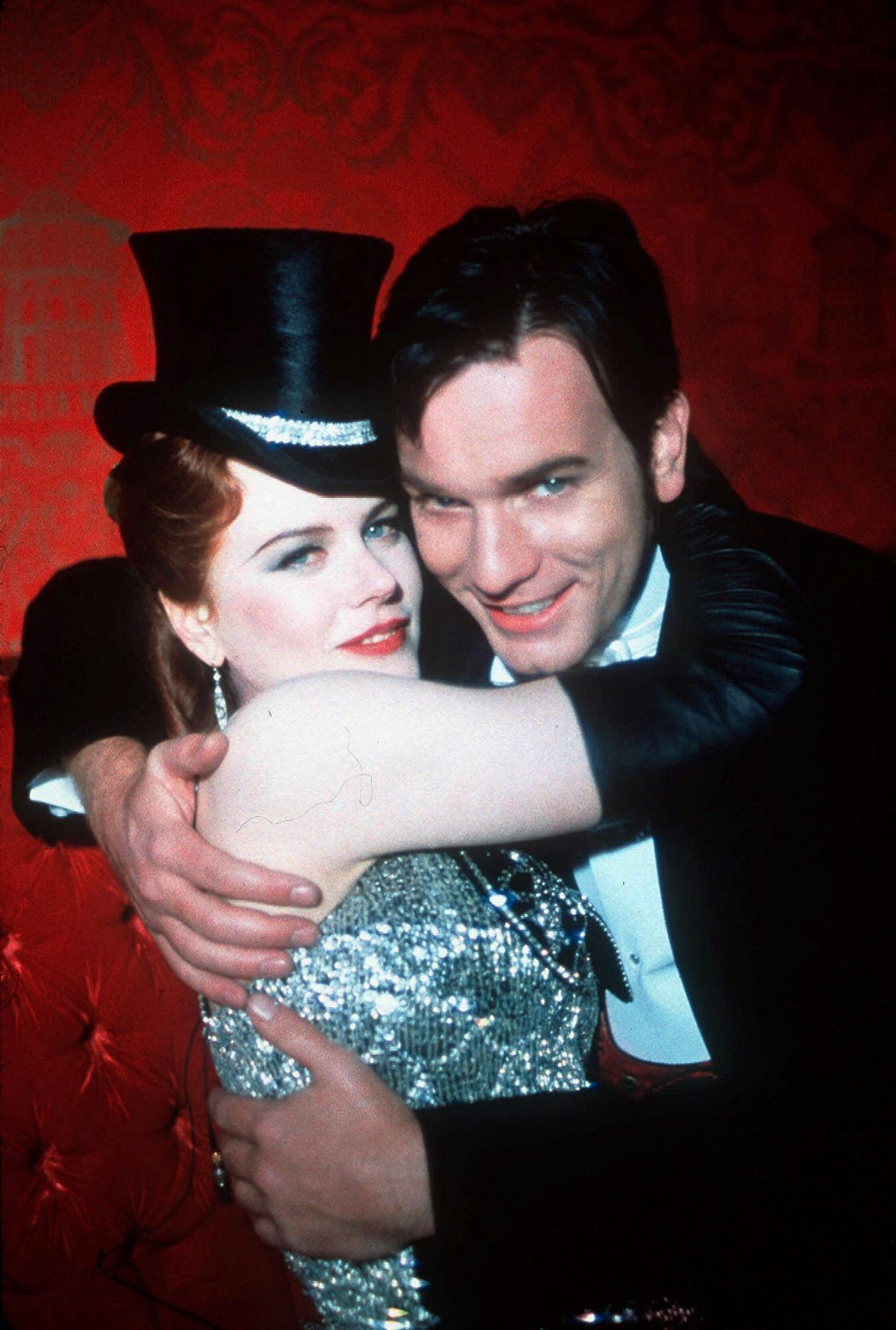 Nicole Kidman, left, plays cabaret singer Satine and Ewan McGregor plays Christian, a young poet who falls in love with her, in "Moulin Rouge." The film, which recreates the heady days of late 19th-century Paris, will be in competition at the Cannes Film Festival, which starts Wednesday, May 9, 2001. (20th Century Fox)