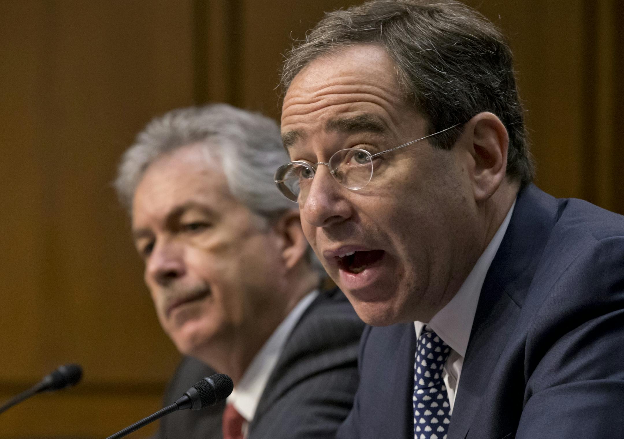 The Senate Foreign Relations Committee holds a hearing with Deputy Secretary of State Thomas Nides, right, who is in charge of management, and Deputy Secretary of State William Burns,left, who is in charge of policy, after an independent review panel said this week that serious bureaucratic mismanagement was responsible for inadequate security at the mission in Benghazi, Libya, where the U.S. ambassador and three other Americans were killed on Sept. 11, on Capitol Hill in Washington, Thursday, D