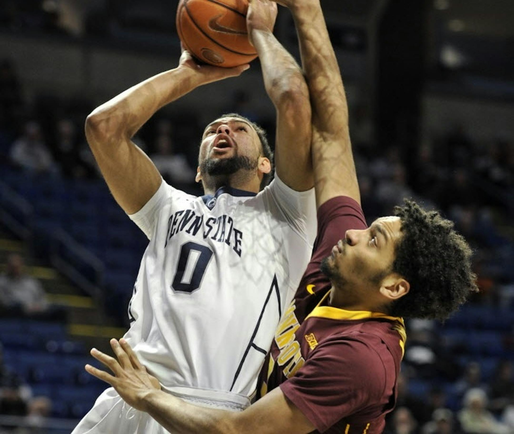 Penn State's Payton Banks (0) drives past Minnesota's Jordan Murphy during an NCAA college basketball game, Tuesday, Jan. 5, 2016 in University Park, Pa. (Nabil K. Mark/Centre Daily Times via AP)